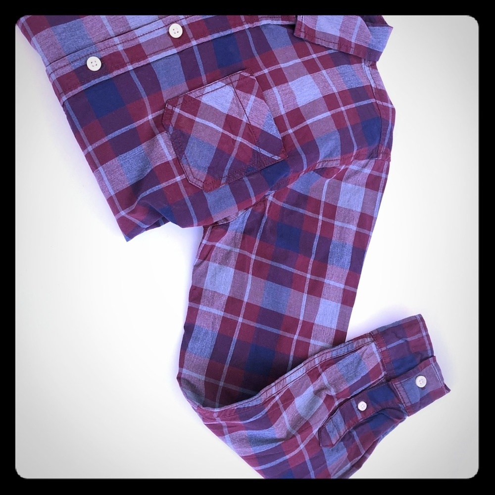 Long sleeved button up shirt with flannel pattern